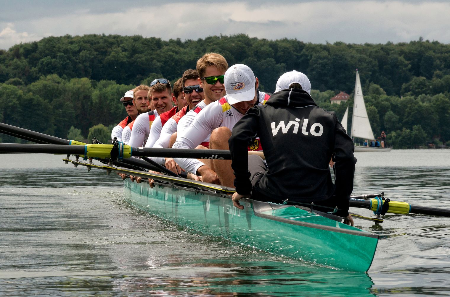 Ruderstadt Ratzeburg Achter Herren im Ruderboot auf dem See